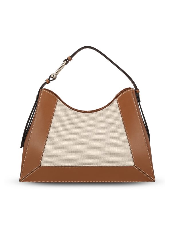 Borsa realizzata in pelle e tessuto.