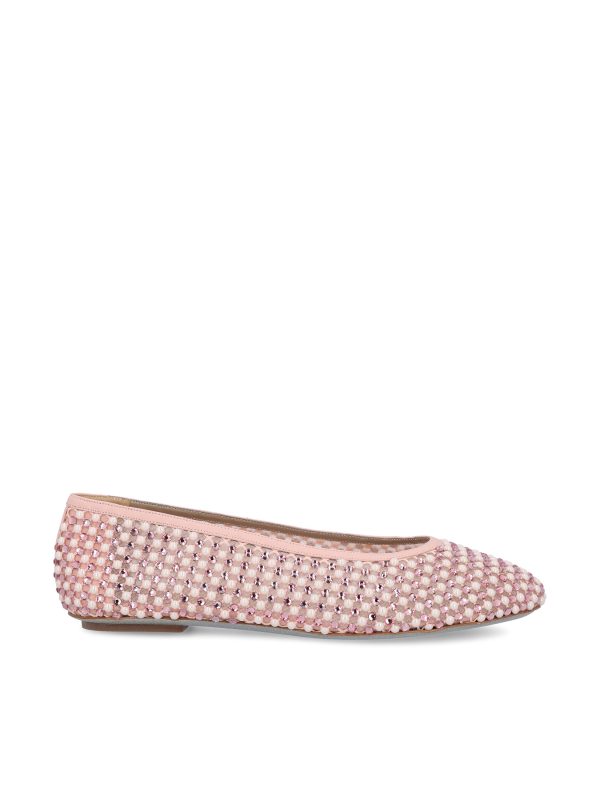 Ballerine realizzate in rete trasparente.
