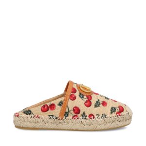 Mule realizzate in rafia sintetica jacquard.