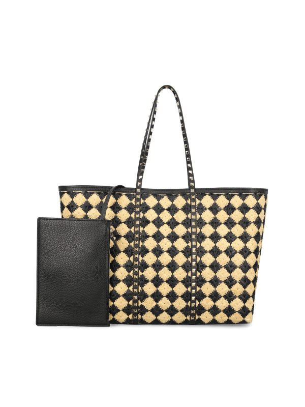 Borsa realizzata in rafia sintetica.