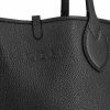 Borsa realizzata in pelle e tessuto. — изображение 4