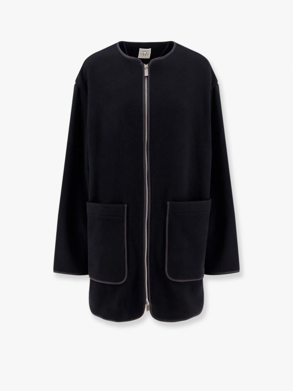 Wool blend coat with lateral slits