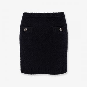 Wool skirt with bouclé effect, mini lenght and pockets with ribbed profiles and gg enamelled buttons