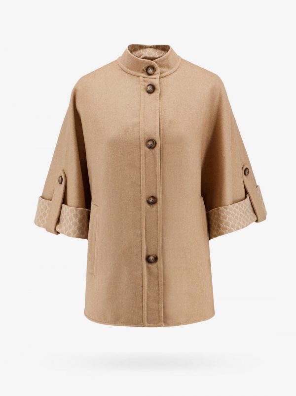 Virgin wool and cashmere cape wih pockets on the front