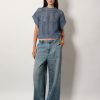 Stone-washed flared jeans — изображение 2