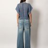 Stone-washed flared jeans — изображение 3