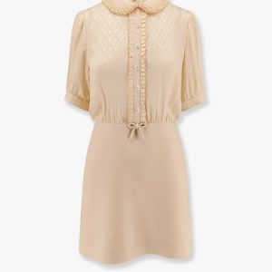 Short crepe couture dress with silk jaquard toute la v top with ruffle detail