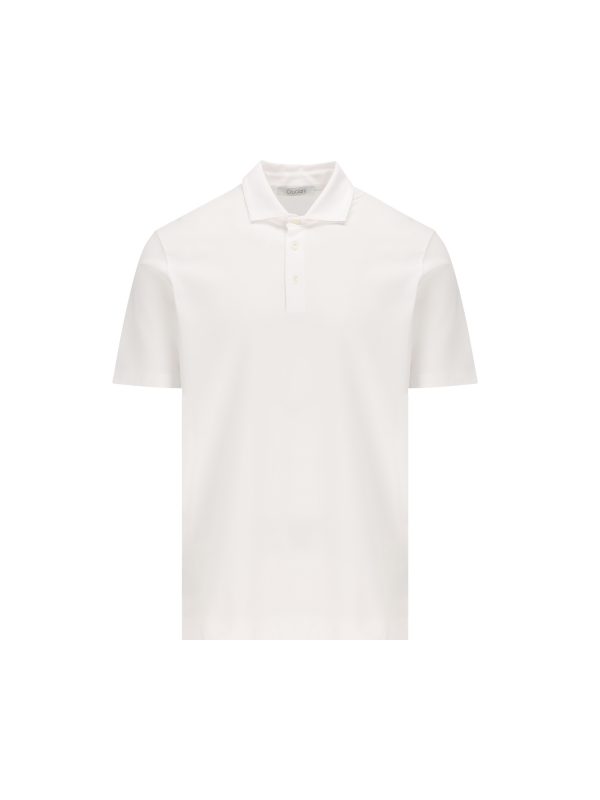 Polo realizzata in cotone ed elastan.