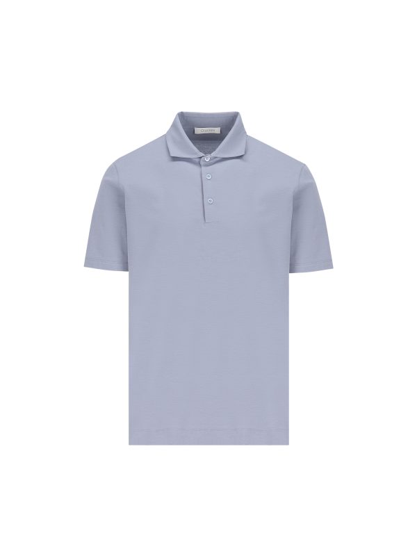 Polo realizzata in cotone ed elastan.