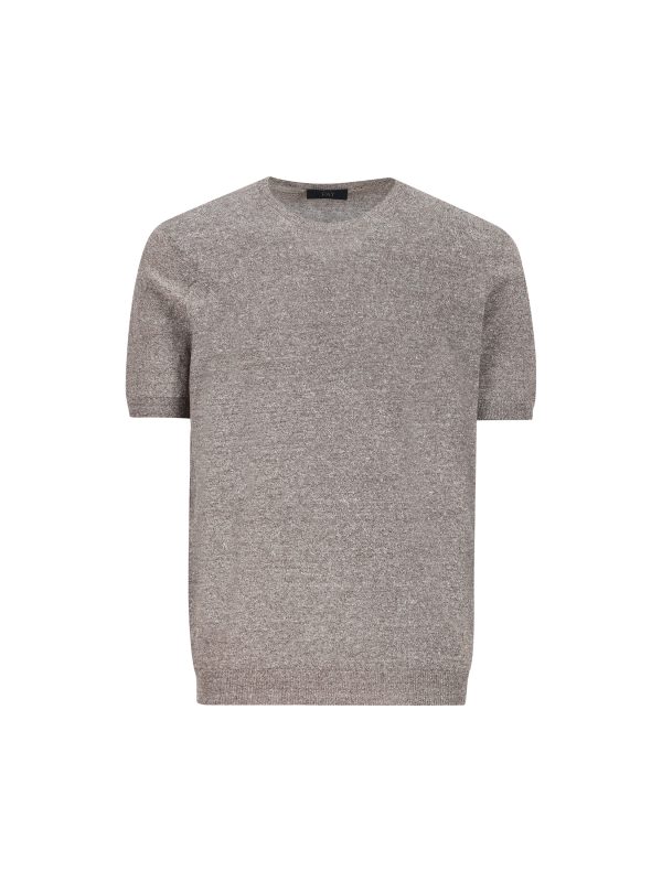 Polo realizzata in lino e cotone.